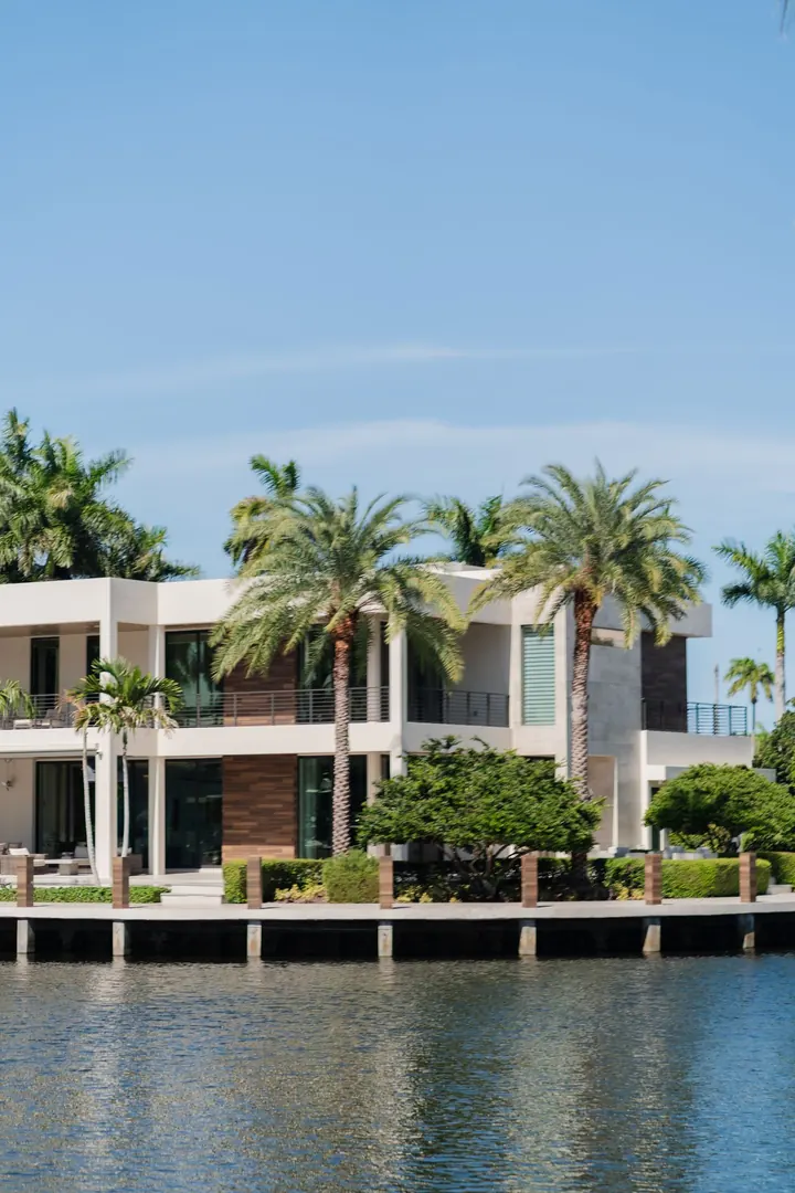 Waterfront Florida home with palm trees, water heater installation Gateway Fort Myers